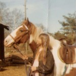 Lin Hallberg med sin häst när hon var 12 år